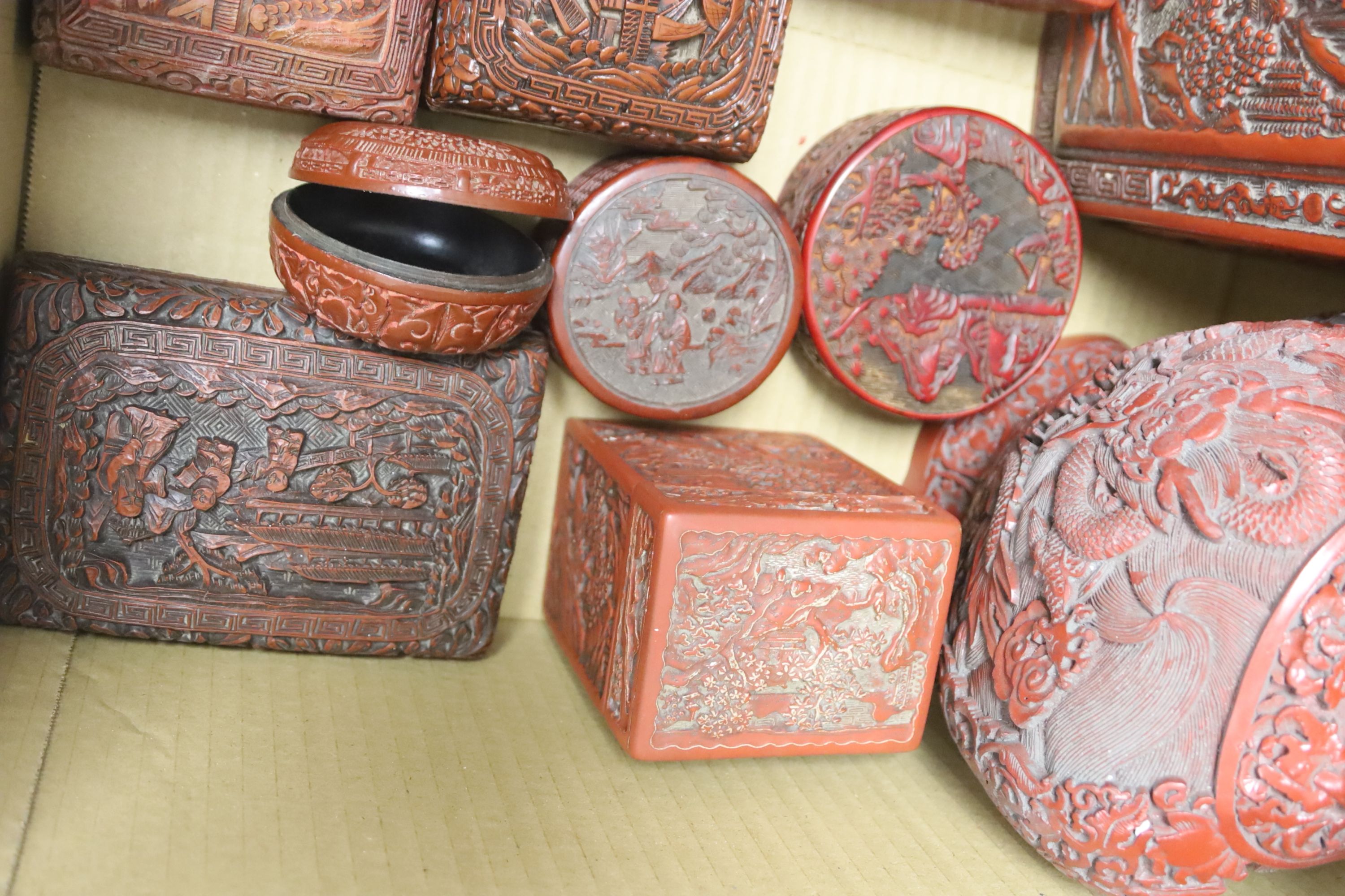 An assortment of Chinese cinnabar lacquer and other later boxes, largest 29 x 10cm